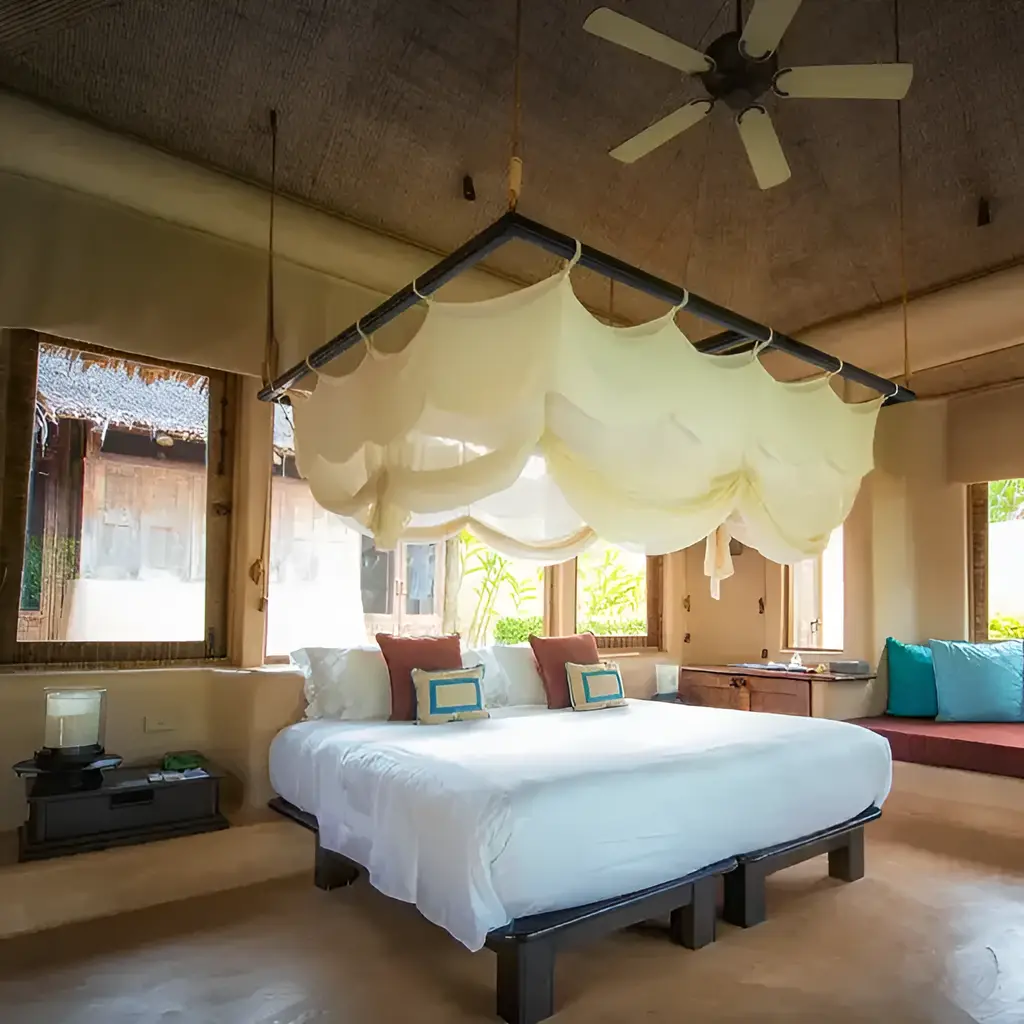 Aménagement intérieur bien-être Guadeloupe salon zen femme détendue plantes naturelles